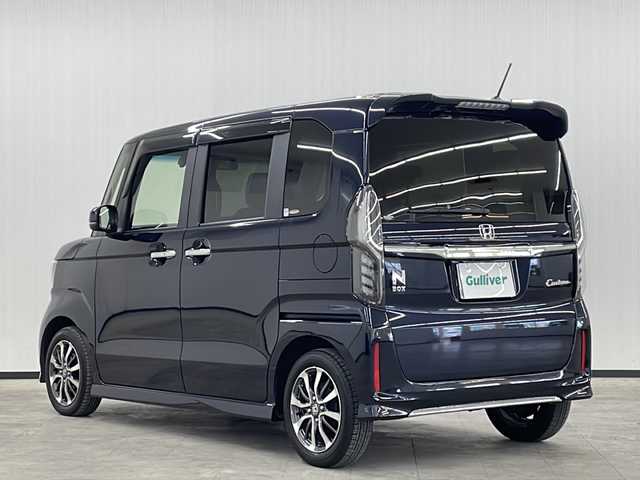 ホンダ Ｎ ＢＯＸ カスタム L 長崎県 2022(令4)年 1.7万km ミッドナイトブルービームM ワンオーナー/純正メモリナビ(VXM-224VFi)/（フルセグ/DVD/CD/Bluetooth）/バックカメラ/片側パワースライドドア/追従型クルーズコントロール/衝突軽減システム/レーンキープアシスト/純正LEDヘッドライト/純正14インチアルミホイール/純正フロアマット/オートホールド/横滑り防止装置/前後コーナーセンサー/盗難防止装置/オートライト/カーテンエアバック/電格ミラー/USB２口/保証書/取扱説明書