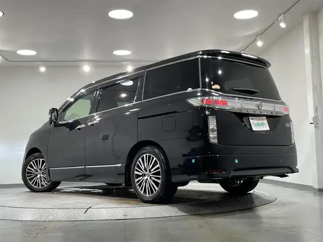 日産 エルグランド 250ハイウェイスターS 愛知県 2021(令3)年 0.6万km 黒 Panasonic１０インチナビ/アルパインフリップダウンモニター/両側パワースライドドア/レーダークルーズコントロール/衝突軽減ブレーキ/ブラインドスポットモニター/クリアランスソナー/車線逸脱警報/ハーフレザーシート/オットマン/バックカメラ/前後ドライブレコーダー/ビルトインＥＴＣ/アクセサリーソケット/純正18インチアルミホイール