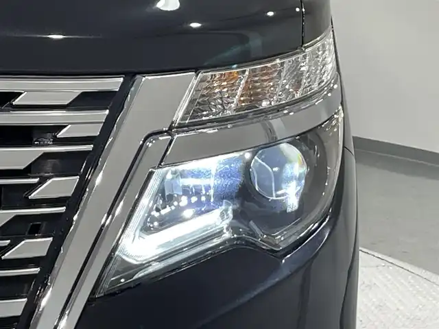 日産 エルグランド 250ハイウェイスターS 愛知県 2021(令3)年 0.6万km 黒 Panasonic１０インチナビ/アルパインフリップダウンモニター/両側パワースライドドア/レーダークルーズコントロール/衝突軽減ブレーキ/ブラインドスポットモニター/クリアランスソナー/車線逸脱警報/ハーフレザーシート/オットマン/バックカメラ/前後ドライブレコーダー/ビルトインＥＴＣ/アクセサリーソケット/純正18インチアルミホイール