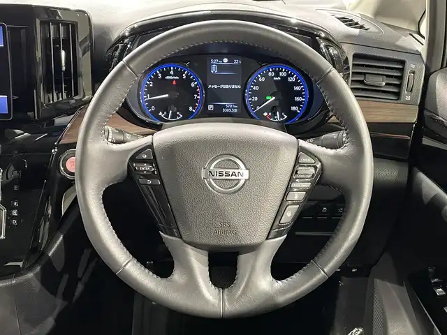 日産 エルグランド 250ハイウェイスターS 愛知県 2021(令3)年 0.6万km 黒 Panasonic１０インチナビ/アルパインフリップダウンモニター/両側パワースライドドア/レーダークルーズコントロール/衝突軽減ブレーキ/ブラインドスポットモニター/クリアランスソナー/車線逸脱警報/ハーフレザーシート/オットマン/バックカメラ/前後ドライブレコーダー/ビルトインＥＴＣ/アクセサリーソケット/純正18インチアルミホイール