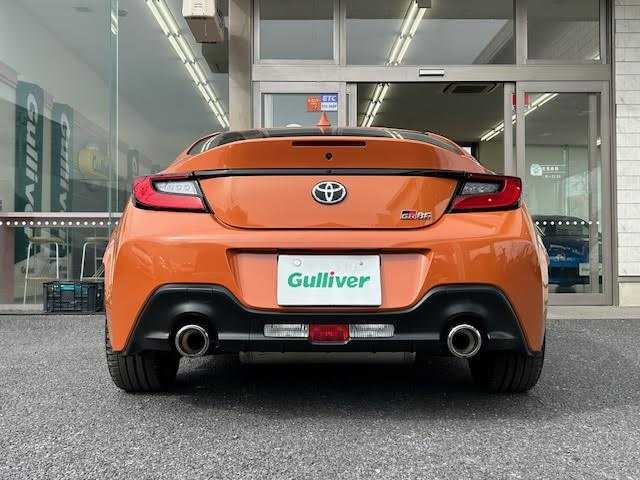 トヨタ ＧＲ８６ RZ 10thアニバーサリーLTD 埼玉県 2023(令5)年 0.3万km フレイムオレンジ ワンオーナー/社外9インチメモリーナビ/CD/DVD/SD/BT/USB/フルセグTV/GRパフォーマンスダンパー/純正18インチAW/クルーズコントロール/ハーフレザーシート/シートヒーター/ステアリングリモコン/バックカメラ/USB充電ポート/オートライト/LEDヘッドライト/リアフォグライト/プッシュスタート/フロアマット