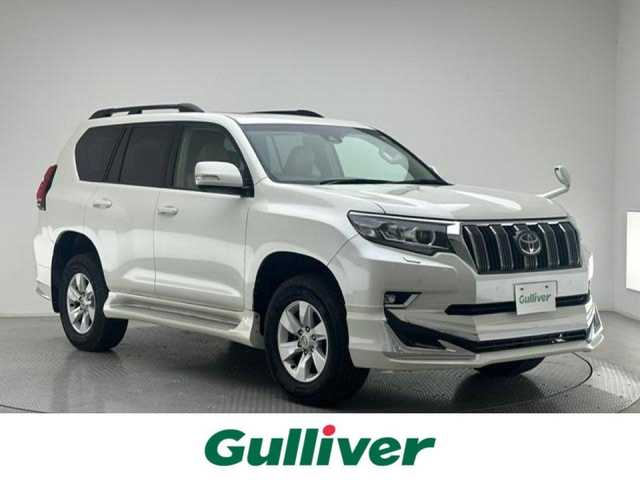トヨタ ランドクルーザー プラド TX Lパッケージ 兵庫県 2020(令2)年 6.5万km ホワイトパールクリスタルシャイン 社外SDナビ(CD/DVD/Bluetooth/フルセグ)/サンルーフ/4WD/ルーフレール/レザーシート/シートヒーター/エアシート/パワーシート/追従型クルーズコントロール/デジタルインナーミラー/前後コーナーセンサー/オートライト/オートマチックハイビーム/LEDヘッドライト/純正17インチアルミホイール/純正フロアマット/社外エアロ