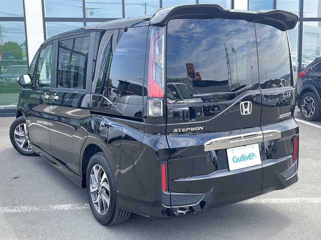 ホンダ ステップワゴン スパーダ クルスピセンシング 長野県 2017(平29)年 1.1万km プレミアムスパークルブラックパール ・4WD/・純正SDメモリナビ/ (CD/DVD/フルセグTV/Bluetooth/USB/MSV)/・バックカメラ/・ビルトインETC/・両側パワースライドドア/・前方ドライブレコーダー/・ハーフレザーシート/・前席シートヒーター/・HONDA SENSING/・アダプティブクルーズコントロール（ACC）/・衝突軽減ブレーキ（CMBS）/・車線維持支援システム（LKAS）/・誤発進抑制機能/・先行車発進お知らせ機能/・標識認識機能/・横滑り防止機能/・純正16インチアルミホイール/・スマートキー/・オートライト/・純正LEDヘッドライト/・パドルシフト/・カーテンエアバック/・保証書/・取扱説明書