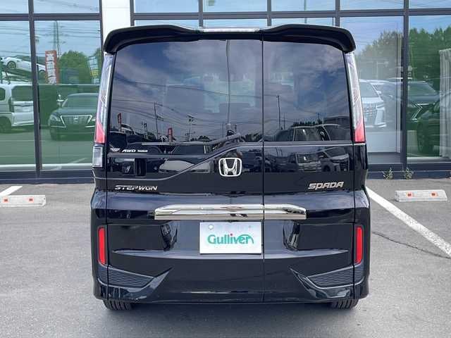 ホンダ ステップワゴン スパーダ クルスピセンシング 長野県 2017(平29)年 1.1万km プレミアムスパークルブラックパール ・4WD/・純正SDメモリナビ/ (CD/DVD/フルセグTV/Bluetooth/USB/MSV)/・バックカメラ/・ビルトインETC/・両側パワースライドドア/・前方ドライブレコーダー/・ハーフレザーシート/・前席シートヒーター/・HONDA SENSING/・アダプティブクルーズコントロール（ACC）/・衝突軽減ブレーキ（CMBS）/・車線維持支援システム（LKAS）/・誤発進抑制機能/・先行車発進お知らせ機能/・標識認識機能/・横滑り防止機能/・純正16インチアルミホイール/・スマートキー/・オートライト/・純正LEDヘッドライト/・パドルシフト/・カーテンエアバック/・保証書/・取扱説明書