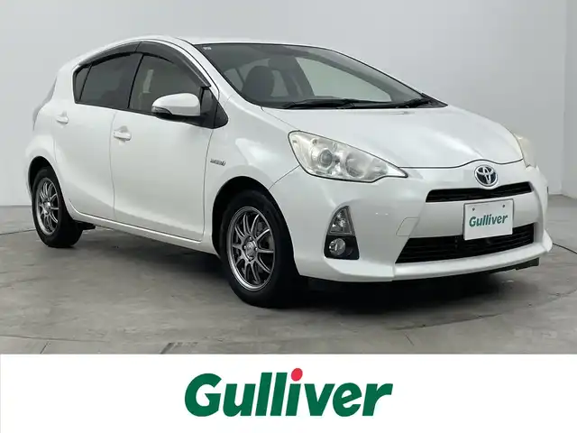 トヨタ アクア G ブラックソフトレザーセレ 大分県 2013(平25)年 7.1万km ライムホワイトパールクリスタルシャイン AW付スタッドレスタイヤ車載/純正SDナビ/CD/DVD/フルセグTV/Bluetooth/車外カメラ(前後)/ECO/EVモード/スペアキー1本/ETC