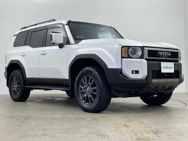 トヨタ ランドクルーザー ２５０ VX 鹿児島県 2024(令6)年 0.3万km プラチナホワイトパールマイカ 純正ナビ/Bluetooth/フルセグ/レーダークルーズコントロール/セーフティセンス/パワーバックドア/運転席パワーシート/オートハイビーム/サンルーフ/D/Nシートヒーター/D/Nベンチレーション/スペアキー/デジタルインナーミラー/ETC2.0/ワンオーナー