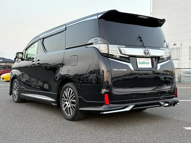 トヨタ ヴェルファイア Z Gエディション 大分県 2015(平27)年 7.1万km スパークリングブラックパールクリスタルシャイン ・純正ナビ(CD/DVD/BT/SD)/・フルセグテレビ/・バックモニター/・フリップダウンモニター/・モデリスタ/・サンルーフ/・両側パワースライドドア/・衝突軽減ブレーキ/・コーナーセンサー/・レーダークルーズコントロール/・ドライブレコーダー/・ETC/・デジタルインナーミラー/・MTモード付きAT/・ステアリングヒーター/・ブレーキホールド/・パワーシート/・シートメモリー/・スマートキー/・プッシュスタートボタン/・純正アルミホイール