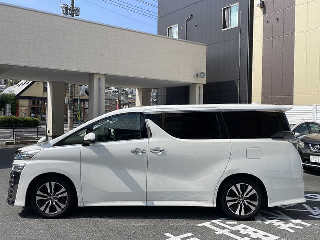 トヨタ ヴェルファイア Z Gエディション 広島県 2019(令1)年 5.7万km ホワイトパールクリスタルシャイン /登録時走行距離/　　　　　　　56228キロ/ワンオーナー/サンルーフ/社外ナビ/バックカメラ/地デジ/両側パワースライドドア/黒革シート/エアシート/PCS/パワーバックドア/スペアキー×１/ビルトインETC/新車時整備手帳/　　【保証書】/取扱説明書/