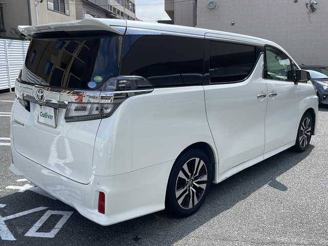 トヨタ ヴェルファイア Z Gエディション 広島県 2019(令1)年 5.7万km ホワイトパールクリスタルシャイン /登録時走行距離/　　　　　　　56228キロ/ワンオーナー/サンルーフ/社外ナビ/バックカメラ/地デジ/両側パワースライドドア/黒革シート/エアシート/PCS/パワーバックドア/スペアキー×１/ビルトインETC/新車時整備手帳/　　【保証書】/取扱説明書/