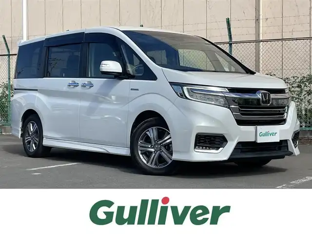 ホンダ ステップワゴン スパーダ ハイブリッド G EX ホンダセンシング 東京都 2017(平29)年 4.7万km プラチナホワイトパール 純正9型ナビ/フルセグTV/CD/DVD再生/バックモニター/ホンダセンシング/前席シートヒーター/追従クルーズ/両側パワースライドドア/ハーフレザーシート/ETC/ドライブレコーダー/純正LEDヘッドライト