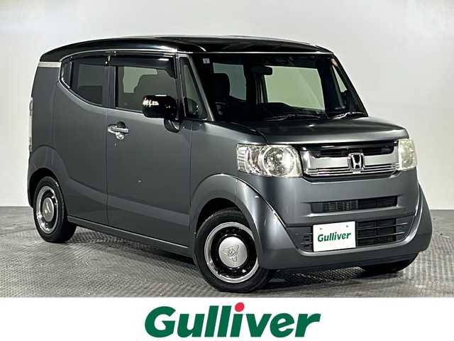 ホンダ Ｎ ＢＯＸ スラッシュ X 沖縄県 2015(平27)年 8.2万km グレーＭⅡ 県外仕入れ　/禁煙車　/純正ナビ　/（フルセグＴＶ　ＣＤ　ＤＶＤ　Ｂｌｕｅｔｏｏｔｈ）　/ストリートロッドスタイルパッケージ　/サウンドマッピングシステム　/あんしんパッケージ/・衝突被害軽減ブレーキ/・サイドカーテンエアバック/・前席i-サイドエアバックシステム/置くだけ充電　/シートヒーター/ハンドルヒーター/ECON/ETC