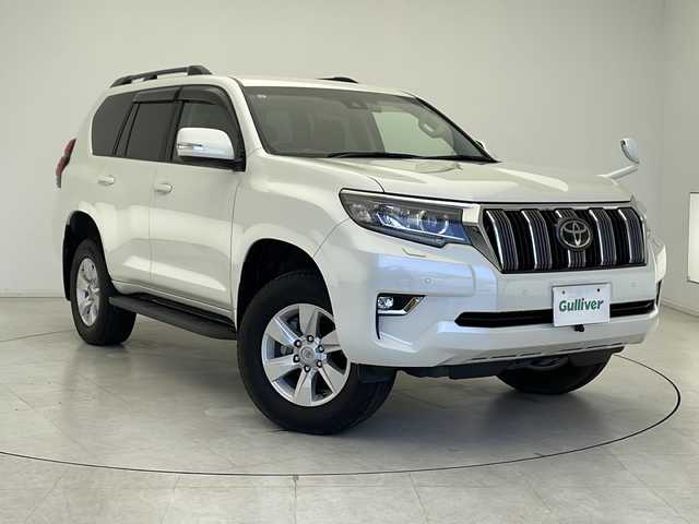 トヨタ ランドクルーザー プラド TX 千葉県 2021(令3)年 1.5万km ホワイトパールクリスタルシャイン 純正9インチナビ/　CD/DVD/Bluetooth/フルセグTV/トヨタセーフティセンス/レーダークルーズコントロール/レーンキープアシスト/衝突軽減ブレーキ/クリアランスソナー/先行車発進警報/ロードサインアシスト/オートハイビーム/ルーフレール/7人乗り/木目調ステアリング/ETC2.0/前方ドラレコ/LEDヘッドライト/フォグランプ/F/Bカメラ/ドアバイザー/フロアマット