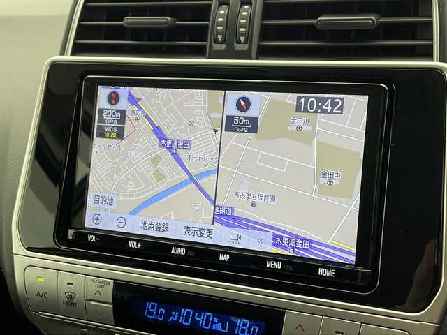 トヨタ ランドクルーザー プラド TX 千葉県 2021(令3)年 1.5万km ホワイトパールクリスタルシャイン 純正9インチナビ/　CD/DVD/Bluetooth/フルセグTV/トヨタセーフティセンス/レーダークルーズコントロール/レーンキープアシスト/衝突軽減ブレーキ/クリアランスソナー/先行車発進警報/ロードサインアシスト/オートハイビーム/ルーフレール/7人乗り/木目調ステアリング/ETC2.0/前方ドラレコ/LEDヘッドライト/フォグランプ/F/Bカメラ/ドアバイザー/フロアマット