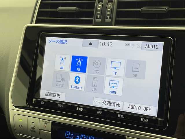 トヨタ ランドクルーザー プラド TX 千葉県 2021(令3)年 1.5万km ホワイトパールクリスタルシャイン 純正9インチナビ/　CD/DVD/Bluetooth/フルセグTV/トヨタセーフティセンス/レーダークルーズコントロール/レーンキープアシスト/衝突軽減ブレーキ/クリアランスソナー/先行車発進警報/ロードサインアシスト/オートハイビーム/ルーフレール/7人乗り/木目調ステアリング/ETC2.0/前方ドラレコ/LEDヘッドライト/フォグランプ/F/Bカメラ/ドアバイザー/フロアマット