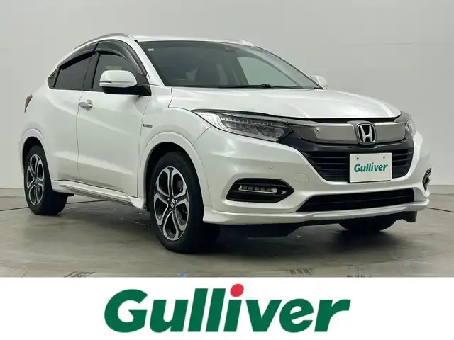 ホンダ ヴェゼル ハイブリッド Z ホンダセンシング 岡山県 2019(平31)年 3.9万km プラチナホワイトパール 純正8型ナビ VXM-197VFEi/地デジ/Bluetooth/DVD/CD/バックカメラ/ビルトインETC/ホンダセンシング /アダプティブクルーズコントロール/LEDライト/オートライト/カーテンエアバッグ/ハーフレザー/シートヒーター /純正17インチアルミ/前後ドラレコ /パドルシフト /純正マット/プッシュスタート /スマートキー