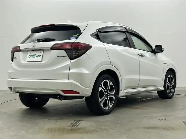 ホンダ ヴェゼル ハイブリッド Z ホンダセンシング 岡山県 2019(平31)年 3.9万km プラチナホワイトパール 純正8型ナビ VXM-197VFEi/地デジ/Bluetooth/DVD/CD/バックカメラ/ビルトインETC/ホンダセンシング /アダプティブクルーズコントロール/LEDライト/オートライト/カーテンエアバッグ/ハーフレザー/シートヒーター /純正17インチアルミ/前後ドラレコ /パドルシフト /純正マット/プッシュスタート /スマートキー