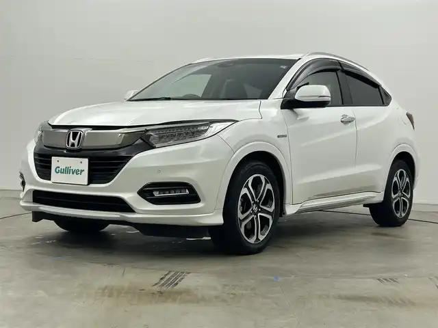 ホンダ ヴェゼル ハイブリッド Z ホンダセンシング 岡山県 2019(平31)年 3.9万km プラチナホワイトパール 純正8型ナビ VXM-197VFEi/地デジ/Bluetooth/DVD/CD/バックカメラ/ビルトインETC/ホンダセンシング /アダプティブクルーズコントロール/LEDライト/オートライト/カーテンエアバッグ/ハーフレザー/シートヒーター /純正17インチアルミ/前後ドラレコ /パドルシフト /純正マット/プッシュスタート /スマートキー