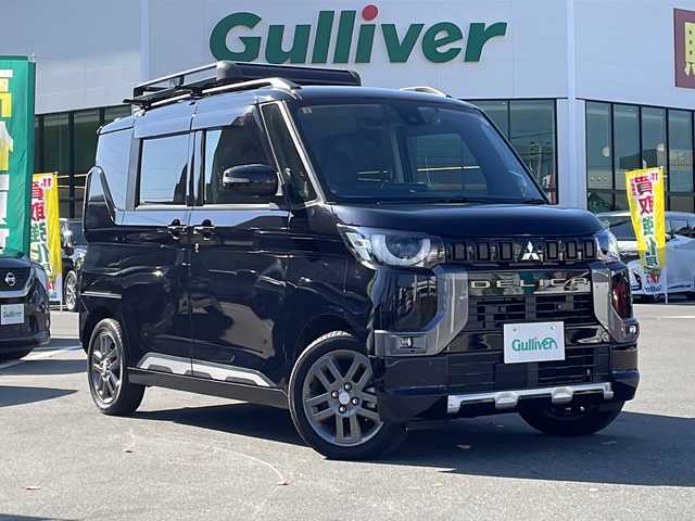 三菱 デリカミニ T プレミアム 長野県 2023(令5)年 2.2万km アメジストブラック 禁煙車/ワンオーナー/４WD/純正9インチナビ/【MM222D-LM】/（フルセグTV/Bluetooth）/e-Assist./・衝突被害軽減ブレーキ/・踏み間違い衝突防止アシスト/・車線逸脱防止支援機能/・オートマチックハイビーム/・ふらつき警報/・前方衝突予測警報/・標識検知システム/・先行車発進通知/・マイパイロット（レーダークルーズコントロール・車線維持支援）/・デジタルルームミラー/・マルチアラウンドモニター/ビルトインETC/ハンズフリー両側パワースライドドア/ドライブレコーダー/ハーフレザーシート/前席シートヒーター/ステアリングヒーター/革巻きステアリング/ステアリングスイッチ/パドルシフト/電動パーキングブレーキ/ブレーキホールド/LEDヘッドライト/フォグランプ/オートライト/スマートキー/Pスタート/電動格納ミラー/純正15インチAW/純正ラバーマット/ルーフレール