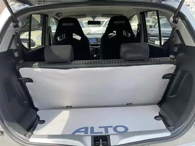 スズキ アルト ワークス 愛知県 2021(令3)年 0.8万km スチールシルバーM ワンオーナー/ターボ/5速MT/社外メモリナビ/（DVD/フルセグTV/Bluetooth/USB）/前席レカロセミバケットシート/横滑り防止機能/純正HIDヘッドライト/フォグランプ/純正15インチアルミホイール/スマートキー/保証書/取扱説明書