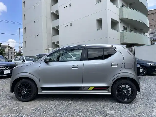 スズキ アルト ワークス 愛知県 2021(令3)年 0.8万km スチールシルバーM ワンオーナー/ターボ/5速MT/社外メモリナビ/（DVD/フルセグTV/Bluetooth/USB）/前席レカロセミバケットシート/横滑り防止機能/純正HIDヘッドライト/フォグランプ/純正15インチアルミホイール/スマートキー/保証書/取扱説明書