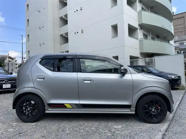 スズキ アルト ワークス 愛知県 2021(令3)年 0.8万km スチールシルバーM ワンオーナー/ターボ/5速MT/社外メモリナビ/（DVD/フルセグTV/Bluetooth/USB）/前席レカロセミバケットシート/横滑り防止機能/純正HIDヘッドライト/フォグランプ/純正15インチアルミホイール/スマートキー/保証書/取扱説明書
