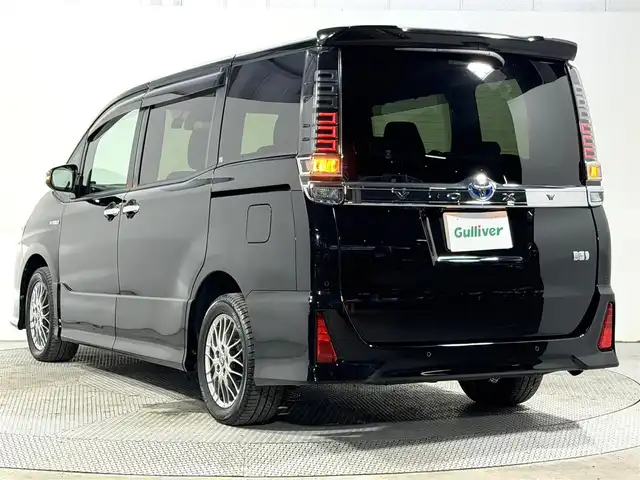 トヨタ ヴォクシー ハイブリッド ZS 煌Ⅱ 大阪府 2019(平31)年 2.2万km ブラック 純正10incナビTV バックカメラ シートヒーター クルーズコントロール 衝突軽減ブレーキ レーンアシスト オートハイビーム 両側パワースライドドア リアオートエアコン ドライブレコーダー ETC