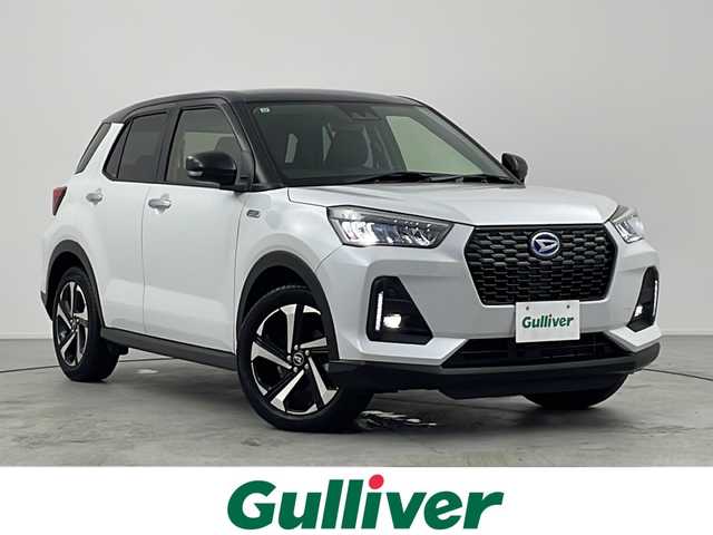 ダイハツ ロッキー プレミアム G HEV 愛知県 2021(令3)年 2.6万km ブラックマイカメタリック/シャイニングホワイトパール /禁煙車//カロッツェリアナビ(AVIC-RZ303)//ワンセグTV//バックカメラ//スマートアシスト//衝突回避支援ブレーキ//衝突警報機能//前後方誤発進抑制//車線逸脱警報//ブラインドスポットモニター//先行車発進お知らせ//標識認識機能//アダプティブドライビングビーム//アダプティブクルーズコントロール//レーンキープコントロール//前後コーナーセンサー//リヤクロストラフィックアラート//フルLEDヘッドライト//オートライト//LEDフォグランプ//合皮コンビシート//前席シートヒーター//純正17インチアルミホイール//純正フロアマット//革巻きステアリング//ステアリングスイッチ//プッシュスタート//電動格納ミラーウィンカー//アイドリングストップ//イモビライザー