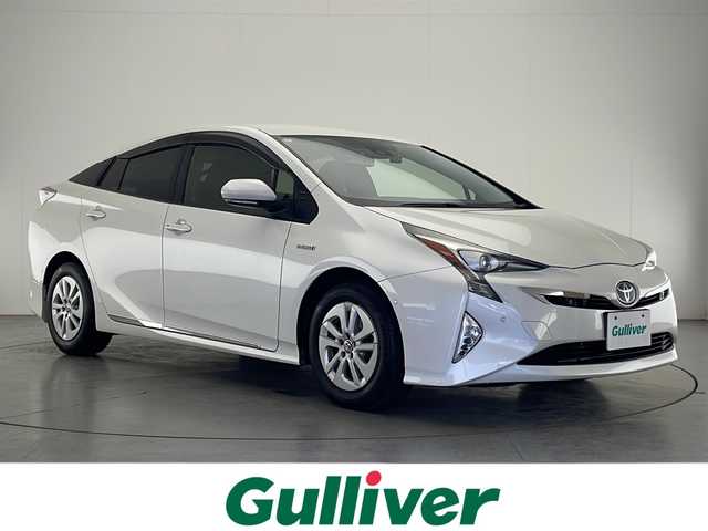 トヨタ プリウス Sセーフティプラス 宮崎県 2018(平30)年 7.3万km ホワイトパールクリスタルシャイン 純正9インチメモリーナビ/　CD DVD BTオーディオ　フルセグTV/バックカメラ/レーダークルーズコントロール/インテリジェントクリアランスソナー/プリクラッシュセーフティ/オートLEDヘッドライト/前後ドライブレコーダー/オートマチックハイビーム/革巻きステアリング/ステアリングリモコン/ビルトインETC