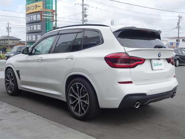 ＢＭＷ Ｘ３ xDrive20d Mスポーツ 静岡県 2018(平30)年 6.6万km アルピンホワイトⅢ 禁煙車/車検令和9年5月まで/2000CCディーゼルターボ/4WD/パーキングアシストプラス/ドライビングアシストプラス/　アクティブクルーズコントロール/　ステアリング/レーンコントロールアシスト/　レーンディパーチャー/　レーンチェンジウォーニング/　アクティブサイドコリジョン/　前車接近警告機能/　衝突回避・被害軽減ブレーキ/　クロストラフィック/アダプティブLEDヘッドライト/ブラックレザーシート/　前席シートヒーター・パワーシート/後席エアコン/社外Mフロントグリル/　フロントスポイラー/　ルーフスポイラー/　テールゲートスポイラー/　Mタイプミラーカバー/　シーケンシャルウインカーミター/　フロントヘッドライト・フォグ/　テールレンズブラッククリア済み/純正OP20インチAW/純正HDDナビ・DVD・CD・BT/　フルセグTV ＴＶキット/　全方位バックカメラ/多数コーディング/　アルピナメーター//　アイドルオフ/バック音ロールス/ユピテル360ど+リヤドライブレコーダー/社外ローダウサス/ワイドスペーサー/社外ワインカラーカーペット/ラゲージマット/カバー/純正スマートキー