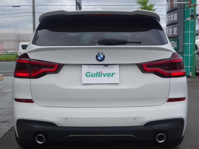 ＢＭＷ Ｘ３ xDrive20d Mスポーツ 静岡県 2018(平30)年 6.6万km アルピンホワイトⅢ 禁煙車/車検令和9年5月まで/2000CCディーゼルターボ/4WD/パーキングアシストプラス/ドライビングアシストプラス/　アクティブクルーズコントロール/　ステアリング/レーンコントロールアシスト/　レーンディパーチャー/　レーンチェンジウォーニング/　アクティブサイドコリジョン/　前車接近警告機能/　衝突回避・被害軽減ブレーキ/　クロストラフィック/アダプティブLEDヘッドライト/ブラックレザーシート/　前席シートヒーター・パワーシート/後席エアコン/社外Mフロントグリル/　フロントスポイラー/　ルーフスポイラー/　テールゲートスポイラー/　Mタイプミラーカバー/　シーケンシャルウインカーミター/　フロントヘッドライト・フォグ/　テールレンズブラッククリア済み/純正OP20インチAW/純正HDDナビ・DVD・CD・BT/　フルセグTV ＴＶキット/　全方位バックカメラ/多数コーディング/　アルピナメーター//　アイドルオフ/バック音ロールス/ユピテル360ど+リヤドライブレコーダー/社外ローダウサス/ワイドスペーサー/社外ワインカラーカーペット/ラゲージマット/カバー/純正スマートキー
