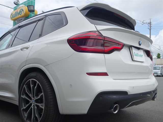 ＢＭＷ Ｘ３ xDrive20d Mスポーツ 静岡県 2018(平30)年 6.6万km アルピンホワイトⅢ 禁煙車/車検令和9年5月まで/2000CCディーゼルターボ/4WD/パーキングアシストプラス/ドライビングアシストプラス/　アクティブクルーズコントロール/　ステアリング/レーンコントロールアシスト/　レーンディパーチャー/　レーンチェンジウォーニング/　アクティブサイドコリジョン/　前車接近警告機能/　衝突回避・被害軽減ブレーキ/　クロストラフィック/アダプティブLEDヘッドライト/ブラックレザーシート/　前席シートヒーター・パワーシート/後席エアコン/社外Mフロントグリル/　フロントスポイラー/　ルーフスポイラー/　テールゲートスポイラー/　Mタイプミラーカバー/　シーケンシャルウインカーミター/　フロントヘッドライト・フォグ/　テールレンズブラッククリア済み/純正OP20インチAW/純正HDDナビ・DVD・CD・BT/　フルセグTV ＴＶキット/　全方位バックカメラ/多数コーディング/　アルピナメーター//　アイドルオフ/バック音ロールス/ユピテル360ど+リヤドライブレコーダー/社外ローダウサス/ワイドスペーサー/社外ワインカラーカーペット/ラゲージマット/カバー/純正スマートキー