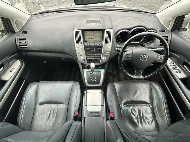 トヨタ ハリアー ハイブリッド プレミアム Sパッケージ 愛知県 2006(平18)年 14.8万km シルバーM メーカーオプションナビ【CD DVD MD ワンセグ】/バックカメラ/ETC/ドライブレコーダー/クルーズコントロール/オートライト/キセノンライト/電動リアゲート/スマートキー/レザーシート/シートヒーター/純正フロアマット/ドアバイザー/電動格納ドアミラー/禁煙車