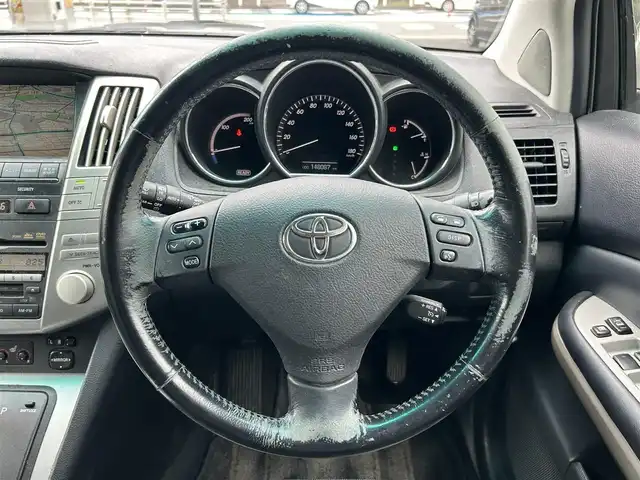 トヨタ ハリアー ハイブリッド プレミアム Sパッケージ 愛知県 2006(平18)年 14.8万km シルバーM メーカーオプションナビ【CD DVD MD ワンセグ】/バックカメラ/ETC/ドライブレコーダー/クルーズコントロール/オートライト/キセノンライト/電動リアゲート/スマートキー/レザーシート/シートヒーター/純正フロアマット/ドアバイザー/電動格納ドアミラー/禁煙車