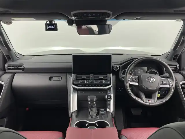 トヨタ ランドクルーザー GRスポーツ 大分県 2023(令5)年 0.8万km グレーメタリック ワンオーナー/サンルーフ/トヨタセーフティーセンス/プリクラッシュセーフティ/レーントレーシングアシスト/レーンディパーチャーアラート/レーダークルーズコントロール（全車速追従機能付）/アダプティブハイビームシステム／オートマチックハイビーム/ロードサインアシスト/発進遅れ告知機能/JBLサウンド/パノラミックビューモニター/12.3型純正ナビ/（フルセグ/Bluetooth/Applecarplay/androidauto)/レーダークルーズコントロール/ブラインドスポットモニター/前後ドライブレコーダー/前後席シートヒーター・ベンチレーションシート/前席パワーシート/赤黒レザーシート/パワーバックドア/クリアランスソナー/マルチテレインモニター/クロールコントロール/電動デフロック（フロント/リア）/ダウンヒル/ヒルアシストコントロール/オートブレーキホールド/保証書・取扱説明書
