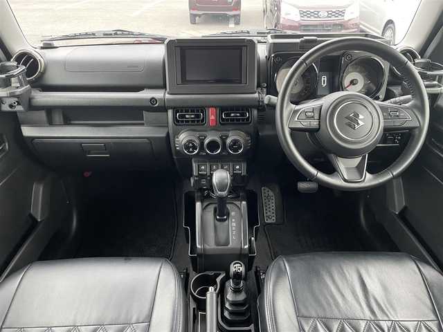 スズキ ジムニー XC 鳥取県 2020(令2)年 3.8万km ブルーイッシュブラックパール3 ４WD・ターボ/ワンオーナー/社外ディスプレイオーディオ/BT/USB/バックカメラ/前後ドライブレコーダー/前席シートヒーター/レーダーブレーキサポート/レーンキープアシスト/クルーズコントロール/LEDヘットライト/純正16インチアルミホイール/ブロックタイヤ/ルーフラック/SUZUKIフロントグリル/オーバーフェンダー/レザー調シートカバー/プッシュエンジンスタート/フロアマット/スタットレスセット積み込/（タイヤ溝6-7部山）