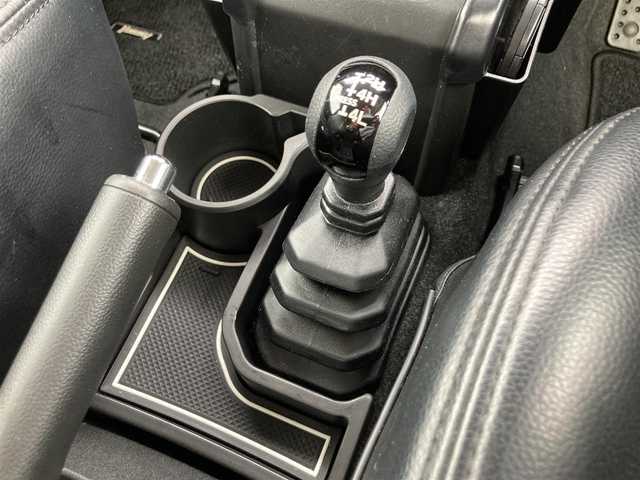 スズキ ジムニー XC 鳥取県 2020(令2)年 3.8万km ブルーイッシュブラックパール3 ４WD・ターボ/ワンオーナー/社外ディスプレイオーディオ/BT/USB/バックカメラ/前後ドライブレコーダー/前席シートヒーター/レーダーブレーキサポート/レーンキープアシスト/クルーズコントロール/LEDヘットライト/純正16インチアルミホイール/ブロックタイヤ/ルーフラック/SUZUKIフロントグリル/オーバーフェンダー/レザー調シートカバー/プッシュエンジンスタート/フロアマット/スタットレスセット積み込/（タイヤ溝6-7部山）