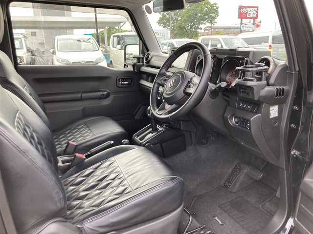 スズキ ジムニー XC 鳥取県 2020(令2)年 3.8万km ブルーイッシュブラックパール3 ４WD・ターボ/ワンオーナー/社外ディスプレイオーディオ/BT/USB/バックカメラ/前後ドライブレコーダー/前席シートヒーター/レーダーブレーキサポート/レーンキープアシスト/クルーズコントロール/LEDヘットライト/純正16インチアルミホイール/ブロックタイヤ/ルーフラック/SUZUKIフロントグリル/オーバーフェンダー/レザー調シートカバー/プッシュエンジンスタート/フロアマット/スタットレスセット積み込/（タイヤ溝6-7部山）