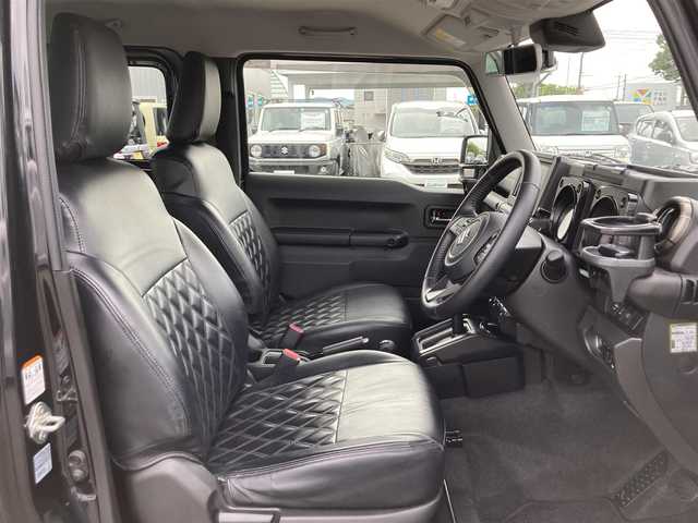 スズキ ジムニー XC 鳥取県 2020(令2)年 3.8万km ブルーイッシュブラックパール3 ４WD・ターボ/ワンオーナー/社外ディスプレイオーディオ/BT/USB/バックカメラ/前後ドライブレコーダー/前席シートヒーター/レーダーブレーキサポート/レーンキープアシスト/クルーズコントロール/LEDヘットライト/純正16インチアルミホイール/ブロックタイヤ/ルーフラック/SUZUKIフロントグリル/オーバーフェンダー/レザー調シートカバー/プッシュエンジンスタート/フロアマット/スタットレスセット積み込/（タイヤ溝6-7部山）