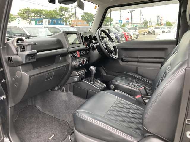 スズキ ジムニー XC 鳥取県 2020(令2)年 3.8万km ブルーイッシュブラックパール3 ４WD・ターボ/ワンオーナー/社外ディスプレイオーディオ/BT/USB/バックカメラ/前後ドライブレコーダー/前席シートヒーター/レーダーブレーキサポート/レーンキープアシスト/クルーズコントロール/LEDヘットライト/純正16インチアルミホイール/ブロックタイヤ/ルーフラック/SUZUKIフロントグリル/オーバーフェンダー/レザー調シートカバー/プッシュエンジンスタート/フロアマット/スタットレスセット積み込/（タイヤ溝6-7部山）