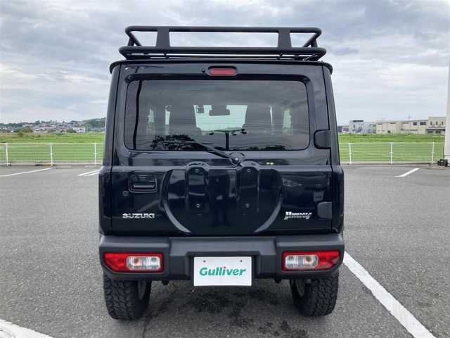スズキ ジムニー XC 鳥取県 2020(令2)年 3.8万km ブルーイッシュブラックパール3 ４WD・ターボ/ワンオーナー/社外ディスプレイオーディオ/BT/USB/バックカメラ/前後ドライブレコーダー/前席シートヒーター/レーダーブレーキサポート/レーンキープアシスト/クルーズコントロール/LEDヘットライト/純正16インチアルミホイール/ブロックタイヤ/ルーフラック/SUZUKIフロントグリル/オーバーフェンダー/レザー調シートカバー/プッシュエンジンスタート/フロアマット/スタットレスセット積み込/（タイヤ溝6-7部山）