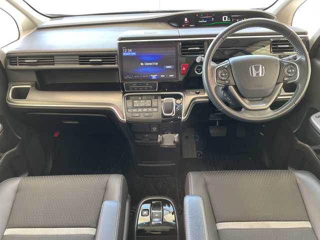 ホンダ ステップワゴン スパーダ ハイブリッド G EX ホンダセンシング 埼玉県 2018(平30)年 4.7万km プレミアムスパークルブラックパール ホンダセンシング /純正10インチメモリナビ/　　CD/DVD/BT/フルセグ  /全方位モニター /両側パワースライドドア /レーダークルーズコントロール /LEDオートライト /ハーフレザーシート /シートヒーター /純正16インチアルミホイール/ステアリングスイッチ /純正ETC/禁煙車