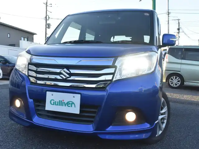 スズキ ソリオ HV SZ 神奈川県 2017(平29)年 9.9万km 青 デュアルカメラブレーキサポート/：前方衝突被害軽減ブレーキ/ケンウッドナビ/：ワンセグTV/：CD再生/：バックカメラ/ビルトインETC/前後ドライブレコーダー/シートヒーター（運転席）/純正15インチアルミホイール/純正フロアマット/：ドアバイザー/純正HIDヘッドライト/：オートヘッドライト/：フロントフォグライト