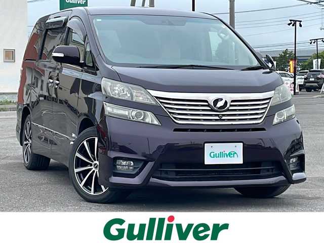 トヨタ ヴェルファイア 3．5Z Gエディション 道央・札幌 2008(平20)年 12.8万km ボルドーマイカメタリック ４WD/純正ディーラーOPナビ/CD/DVD/MD/フルセグ/純正フリップダウンモニター/横滑り防止装置/クルーズコントロール/パーキングセンサー/クリアランスソナー/AFS/センターデフロック/バック/サイド/フロントカメラ/ビルトインETC/両側パワースライドドア/パワーバックドア/前席/２列目パワーシート/D席メモリーシート/N席/２列目オットマン/革巻きウッドコンビステアリング/ステアリングリモコン/AC100V/POLEAUTO/MTモード付AT/レーダー探知機/プッシュスタート/スマートキー/HIDヘッドライト/オートライト/フォグランプ/電動格納ミラー/ウィンカーミラー/フロアマット/ドアバイザー