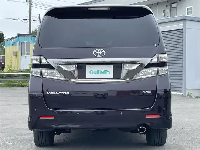 トヨタ ヴェルファイア 3．5Z Gエディション 道央・札幌 2008(平20)年 12.8万km ボルドーマイカメタリック ４WD/純正ディーラーOPナビ/CD/DVD/MD/フルセグ/純正フリップダウンモニター/横滑り防止装置/クルーズコントロール/パーキングセンサー/クリアランスソナー/AFS/センターデフロック/バック/サイド/フロントカメラ/ビルトインETC/両側パワースライドドア/パワーバックドア/前席/２列目パワーシート/D席メモリーシート/N席/２列目オットマン/革巻きウッドコンビステアリング/ステアリングリモコン/AC100V/POLEAUTO/MTモード付AT/レーダー探知機/プッシュスタート/スマートキー/HIDヘッドライト/オートライト/フォグランプ/電動格納ミラー/ウィンカーミラー/フロアマット/ドアバイザー
