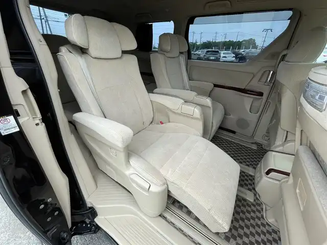 トヨタ ヴェルファイア 3．5Z Gエディション 道央・札幌 2008(平20)年 12.8万km ボルドーマイカメタリック ４WD/純正ディーラーOPナビ/CD/DVD/MD/フルセグ/純正フリップダウンモニター/横滑り防止装置/クルーズコントロール/パーキングセンサー/クリアランスソナー/AFS/センターデフロック/バック/サイド/フロントカメラ/ビルトインETC/両側パワースライドドア/パワーバックドア/前席/２列目パワーシート/D席メモリーシート/N席/２列目オットマン/革巻きウッドコンビステアリング/ステアリングリモコン/AC100V/POLEAUTO/MTモード付AT/レーダー探知機/プッシュスタート/スマートキー/HIDヘッドライト/オートライト/フォグランプ/電動格納ミラー/ウィンカーミラー/フロアマット/ドアバイザー