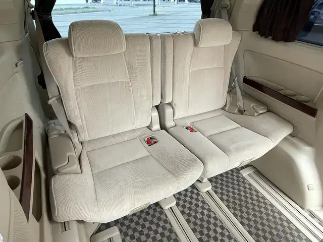 トヨタ ヴェルファイア 3．5Z Gエディション 道央・札幌 2008(平20)年 12.8万km ボルドーマイカメタリック ４WD/純正ディーラーOPナビ/CD/DVD/MD/フルセグ/純正フリップダウンモニター/横滑り防止装置/クルーズコントロール/パーキングセンサー/クリアランスソナー/AFS/センターデフロック/バック/サイド/フロントカメラ/ビルトインETC/両側パワースライドドア/パワーバックドア/前席/２列目パワーシート/D席メモリーシート/N席/２列目オットマン/革巻きウッドコンビステアリング/ステアリングリモコン/AC100V/POLEAUTO/MTモード付AT/レーダー探知機/プッシュスタート/スマートキー/HIDヘッドライト/オートライト/フォグランプ/電動格納ミラー/ウィンカーミラー/フロアマット/ドアバイザー