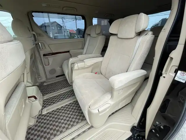 トヨタ ヴェルファイア 3．5Z Gエディション 道央・札幌 2008(平20)年 12.8万km ボルドーマイカメタリック ４WD/純正ディーラーOPナビ/CD/DVD/MD/フルセグ/純正フリップダウンモニター/横滑り防止装置/クルーズコントロール/パーキングセンサー/クリアランスソナー/AFS/センターデフロック/バック/サイド/フロントカメラ/ビルトインETC/両側パワースライドドア/パワーバックドア/前席/２列目パワーシート/D席メモリーシート/N席/２列目オットマン/革巻きウッドコンビステアリング/ステアリングリモコン/AC100V/POLEAUTO/MTモード付AT/レーダー探知機/プッシュスタート/スマートキー/HIDヘッドライト/オートライト/フォグランプ/電動格納ミラー/ウィンカーミラー/フロアマット/ドアバイザー