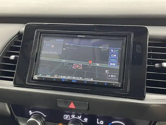 ホンダ フィット e:HEVホーム 道央・札幌 2023(令5)年 2万km クリスタルブラックパール ・４WD/・寒冷地仕様/・社外メモリナビ/　BT/USB/CD/DVD/SD/フルセグ/・社外ETC/・バックカメラ/・ホンダセンシング/・レーダークルーズコントロール/・踏み間違い衝突軽減ブレーキ/・横滑り防止/・レーンキープアシスト/・前後コーナーセンサー/・コンフォートビューパッケージ/・プッシュスタート/・スマートキー/・LEDヘッドライト/・オートライト/・オートマチックハイビーム/・ヘッドランプレベライザー/・純正フロアマット