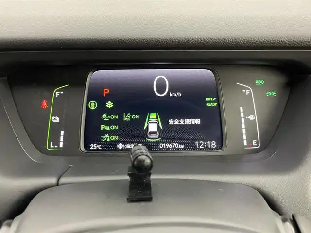 ホンダ フィット e:HEVホーム 道央・札幌 2023(令5)年 2万km クリスタルブラックパール ・４WD/・寒冷地仕様/・社外メモリナビ/　BT/USB/CD/DVD/SD/フルセグ/・社外ETC/・バックカメラ/・ホンダセンシング/・レーダークルーズコントロール/・踏み間違い衝突軽減ブレーキ/・横滑り防止/・レーンキープアシスト/・前後コーナーセンサー/・コンフォートビューパッケージ/・プッシュスタート/・スマートキー/・LEDヘッドライト/・オートライト/・オートマチックハイビーム/・ヘッドランプレベライザー/・純正フロアマット