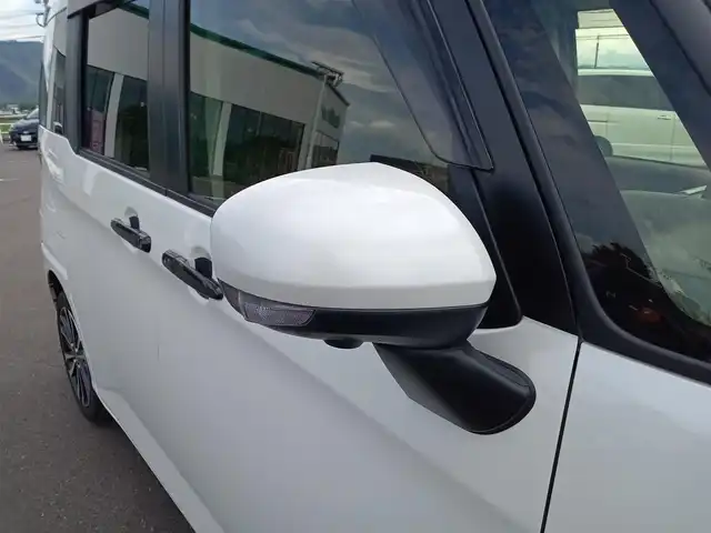 トヨタ ルーミー カスタムG－T 福井県 2023(令5)年 2.6万km パールホワイトⅢ モデリスタフロントエアロ/純正15インチAW/全方位カメラ/両側パワースライドドア/革調シートカバー/全車速追従機能付クルーズコントロール/前後コーナーセンサー/パイオニア9インチメモリナビ/フルセグテレビ/サンシェード/LEDヘッドライト/Fフォグ/オートホールド/本革巻きステアリング/スマートキー